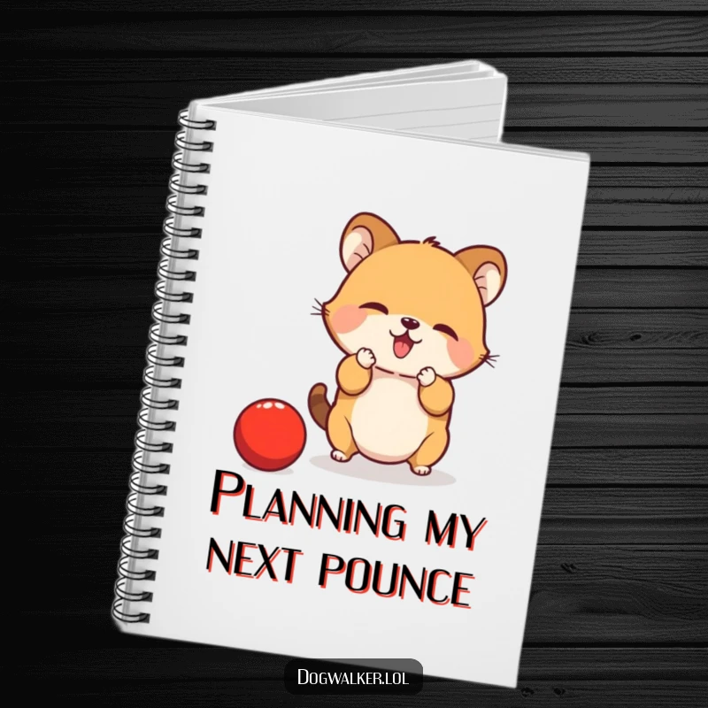 Funny Notebook: A small animal is focused on catching a bouncing red ball with its paws, perfect for jotting ideas.